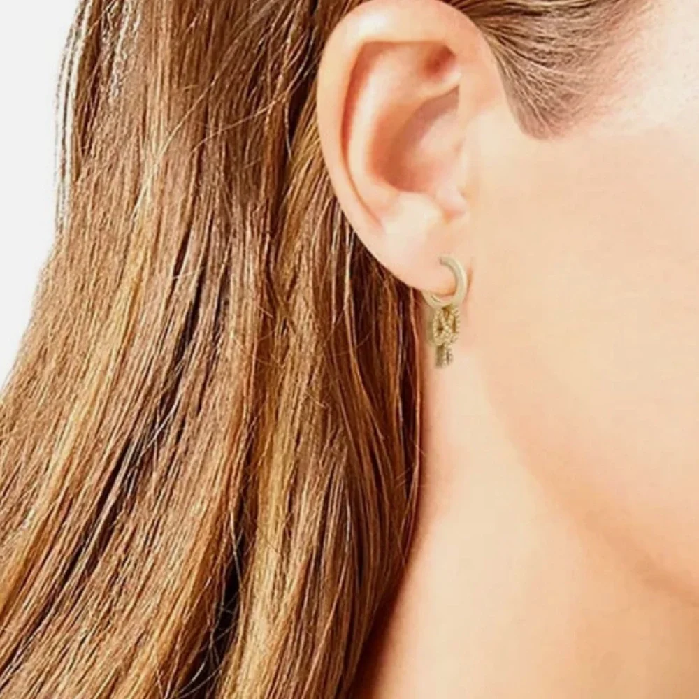 Coach Gold-tone Crystal Bow Hoop Earrings - Picture 10 of 11